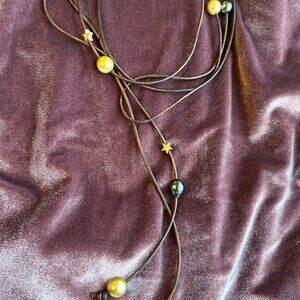 Leather necklace with 7 Genuine South Sea Pearls and 2 18 K Pink Gold Stars